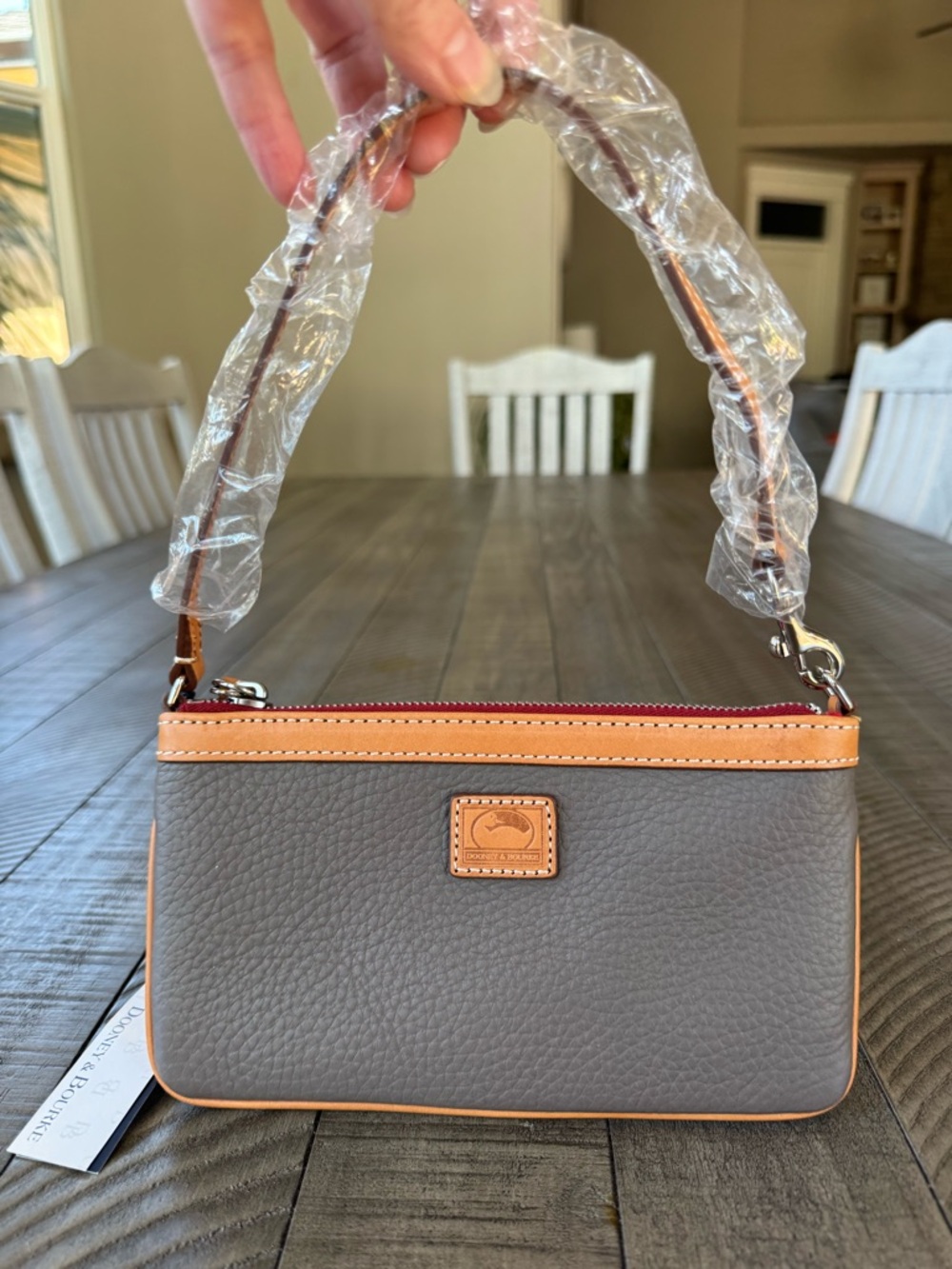 Dooney & Bourke Pebble Leather Large Zip Slim Tassel Wristlet (NWOT)